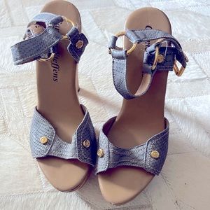 High heeled platform sandals with ankle straps